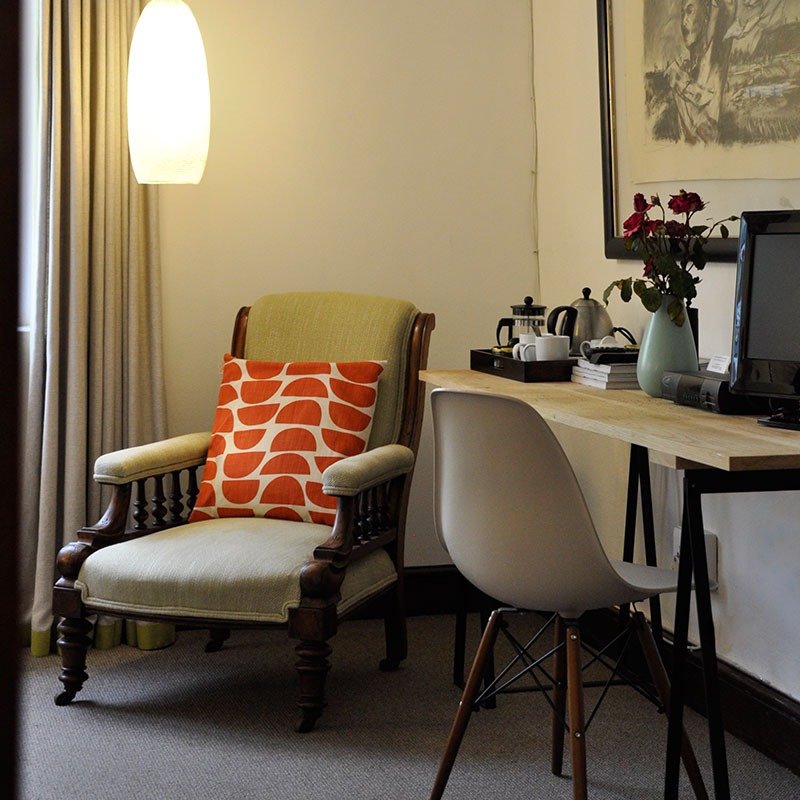 photo of chair and desk in Garden View bedroom at Wildekrans Country House