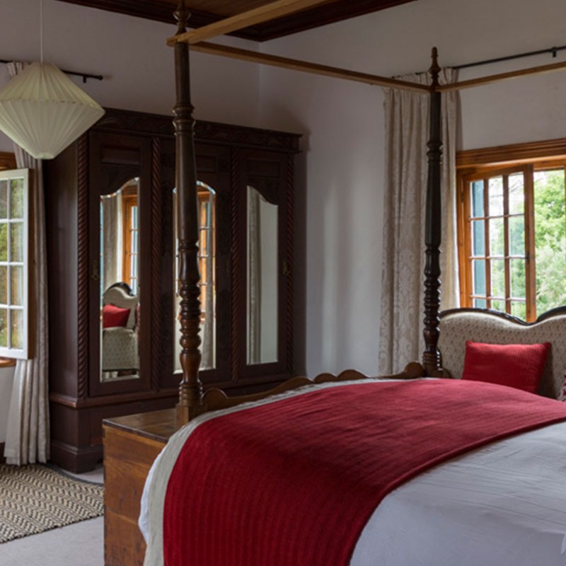 photo of large antique bedroom interior of Mountain View at Wildekrans Country House