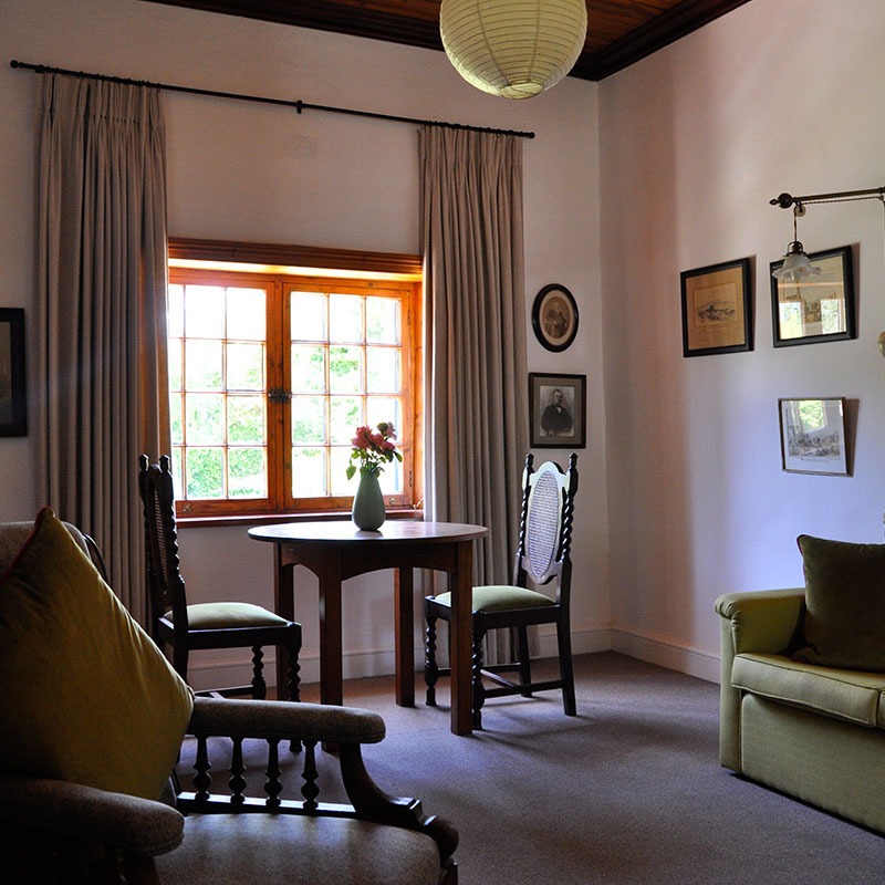 private living room inside Mountain View bedroom at Wildekrans Country House